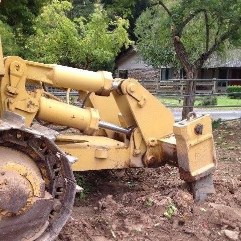 Vic Chiapetta crawler tractor grading soil
